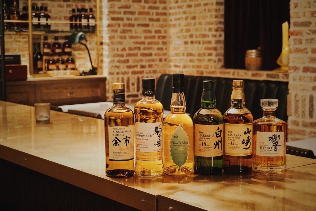 six Japanese Whisky liquor bottles